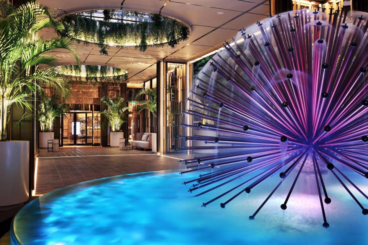Four Seasons Hotel Agios Tychonas Exteriör bild The pool at the Mandarin Oriental, Munich