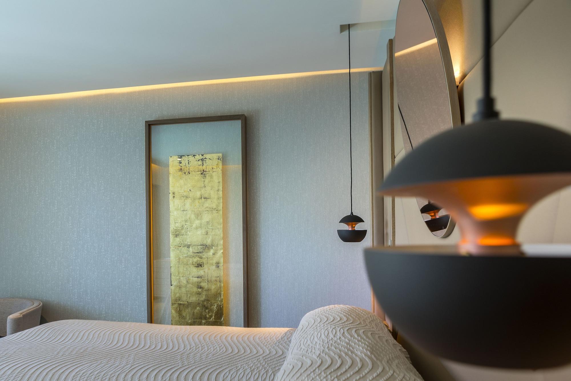 Four Seasons Hotel Agios Tychonas Exteriör bild A bedroom at the hotel