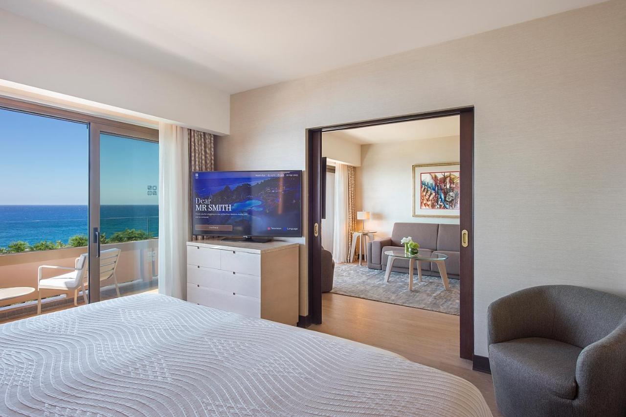 Four Seasons Hotel Agios Tychonas Exteriör bild Suite
