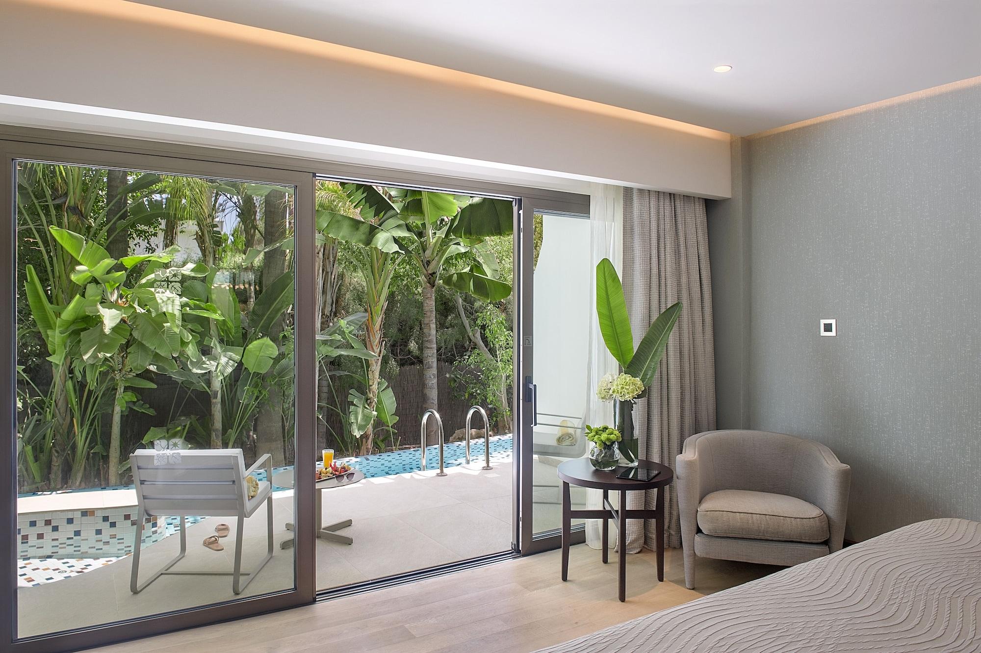 Four Seasons Hotel Agios Tychonas Exteriör bild Deluxe Pool Access